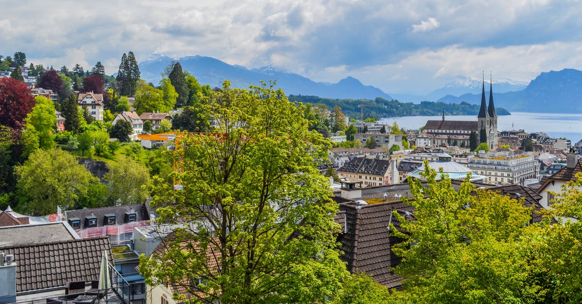 Is there a "best" area in Queensland's Sunshine Coast for currency exchanges? - Town located among green trees against mountains Is there a "best" area in Queensland's Sunshine Coast for currency exchanges? - Town located among green trees against mountains