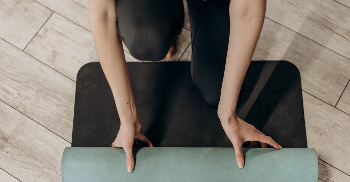 Is there a realtime train position and timetabling tool for Deutsche Bahn trains? [duplicate] - Woman in Black Leggings Unrolling A Yoga Mat