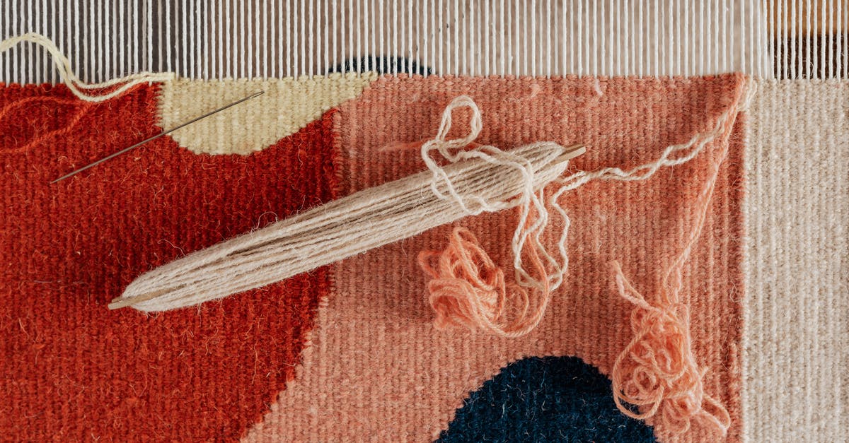 Is there a shuttle bus from Maastricht airport to Maastricht? - From above of shuttle and needle placed on part of handmade carpet with circle pattern on loom frame during weaving process Is there a shuttle bus from Maastricht airport to Maastricht? - From above of shuttle and needle placed on part of handmade carpet with circle pattern on loom frame during weaving process