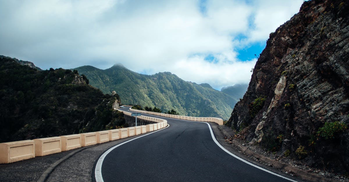 Is there a way to check if the Balkan Mountains passes are open? - Black Asphalt Road Near Cliff Mountain