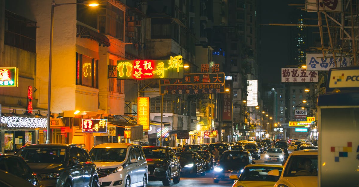 Is there a website or resource that lists specific traffic rules or specific signs for each country? - Street Traffic Scene at Night Is there a website or resource that lists specific traffic rules or specific signs for each country? - Street Traffic Scene at Night