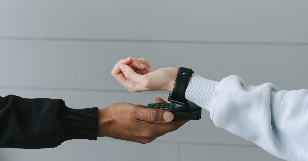 Is there an anonymized credit card for hotel stays? - Person Paying Using Her Smartwatch Is there an anonymized credit card for hotel stays? - Person Paying Using Her Smartwatch