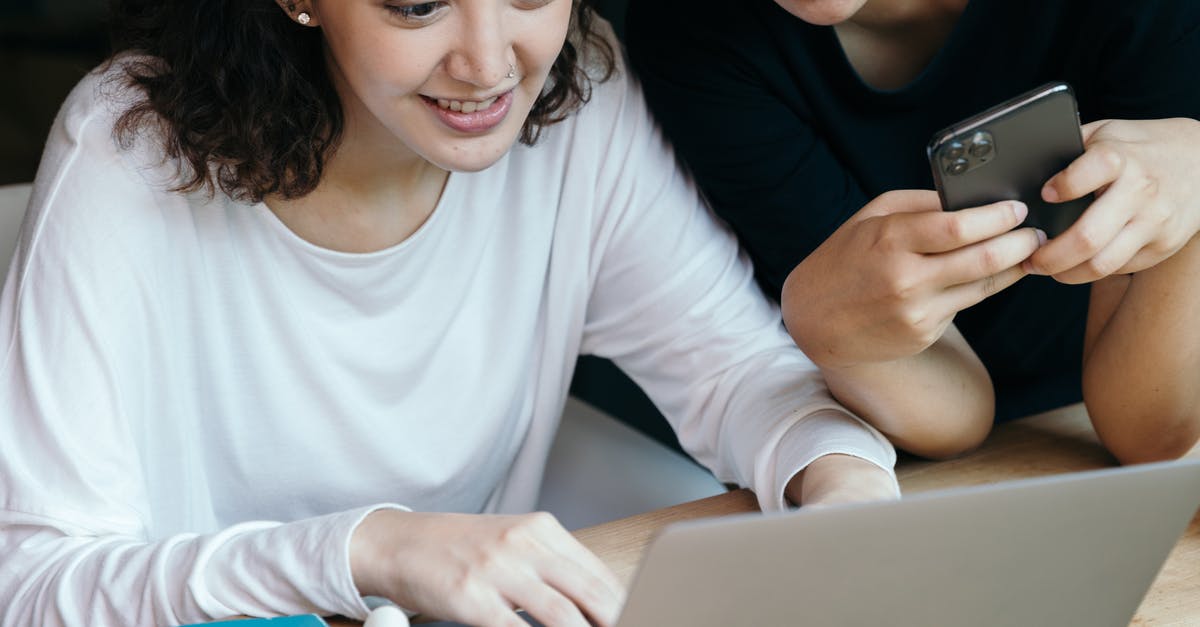 Is there an online resource listing magic shows in Central Europe? [closed] - Friends surfing laptop and using cellphone together