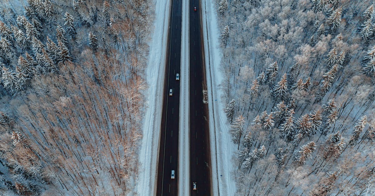 Is there any highway, road or something else that covers the Grand Tour? - Aerial View of Road Between Trees