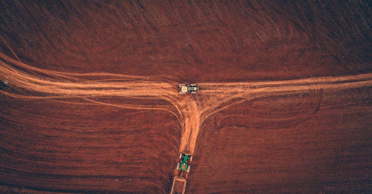 Is there any way to travel from Cameroon to Kinshasa by land? - Heavy equipment driving on sandy road Is there any way to travel from Cameroon to Kinshasa by land? - Heavy equipment driving on sandy road