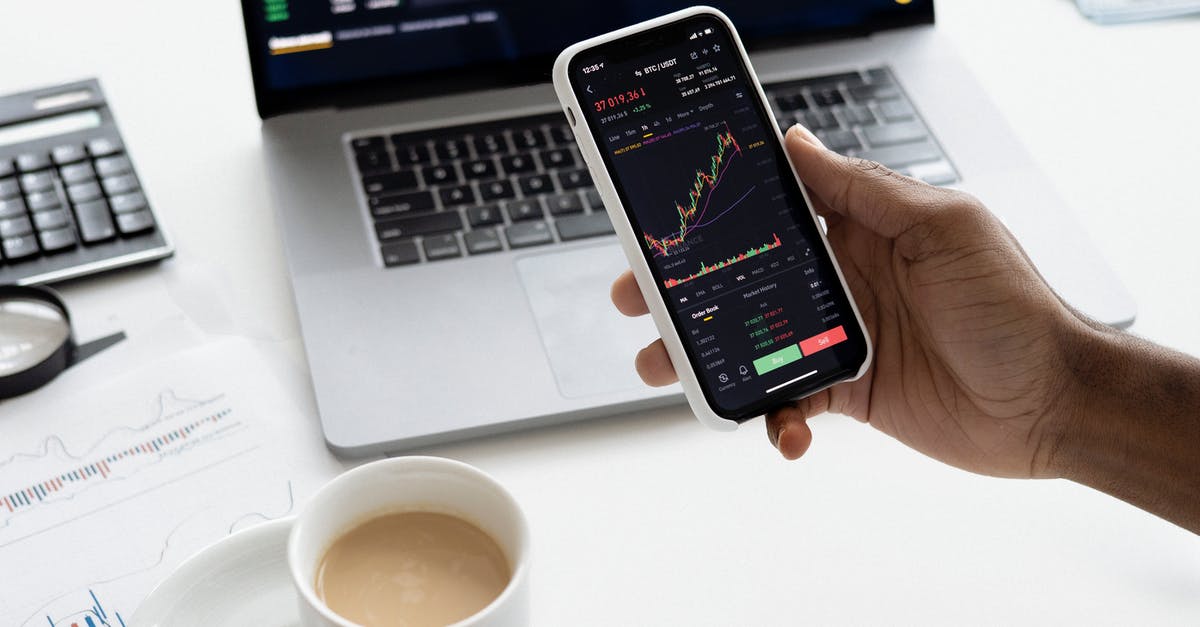 Is there anywhere I can exchange Russian currency while outside Russia? - Person holding a Smartphone Is there anywhere I can exchange Russian currency while outside Russia? - Person holding a Smartphone