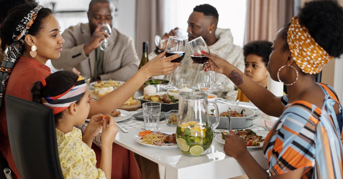 Is there anywhere in the London area to experience an American-style Thanksgiving Dinner? - Family Having Dinner and Celebrating Is there anywhere in the London area to experience an American-style Thanksgiving Dinner? - Family Having Dinner and Celebrating