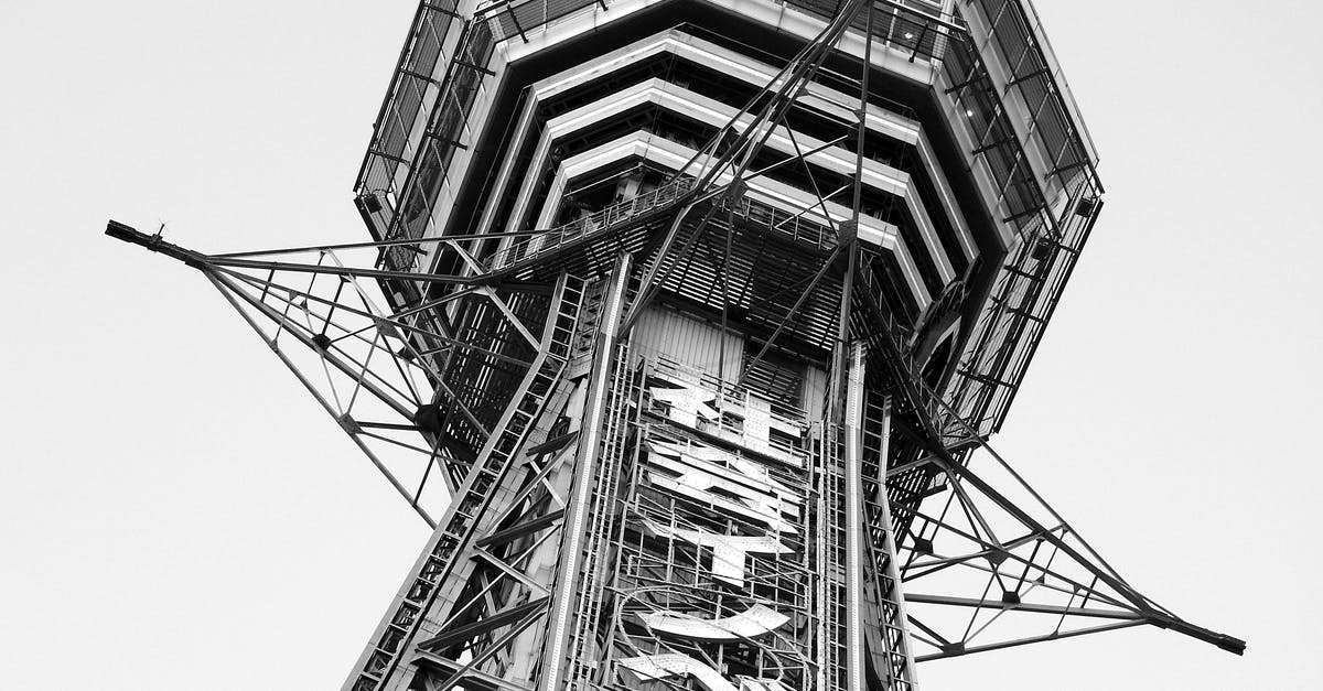 Is there anywhere near central Osaka where I can swim for free? - From below black and white of tall Tsutenkaku tower located in Osaka in Japan