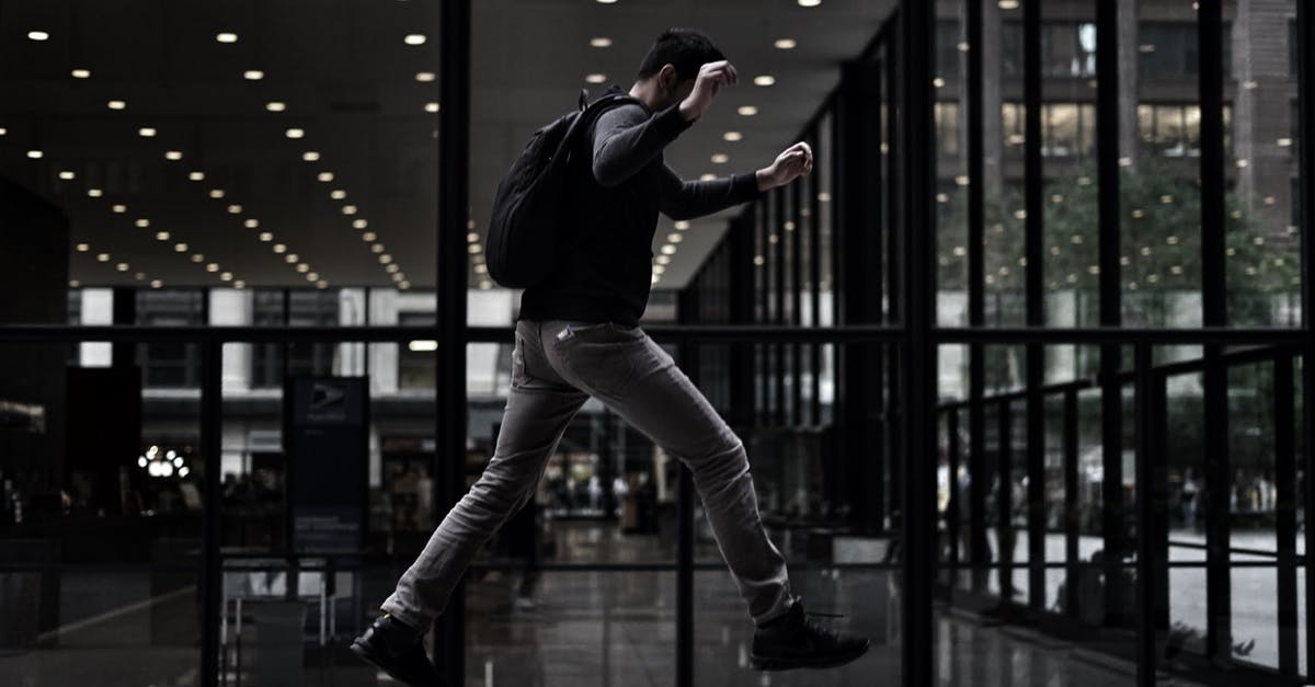 Is there camping gear specifically designed to fit modern air traveling? - Unrecognizable man stepping onto concrete platform in modern style building Is there camping gear specifically designed to fit modern air traveling? - Unrecognizable man stepping onto concrete platform in modern style building
