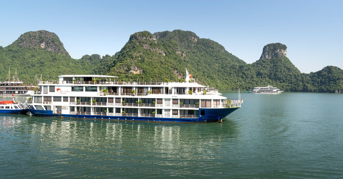 Is there ferry service from Vietnam to Borneo? - White and Blue Ship on Sea Is there ferry service from Vietnam to Borneo? - White and Blue Ship on Sea