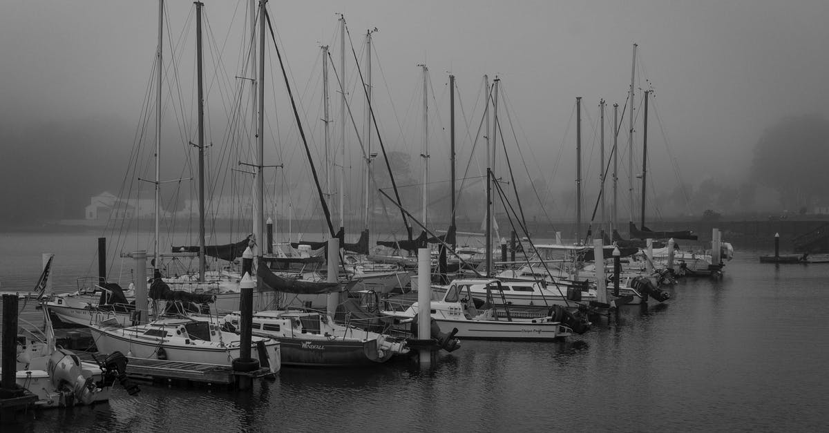 Is there one or more marinas in Okinawa used by private yacht owners that allows non-yachties to visit? - Grayscale Photo of Boats on Dock Is there one or more marinas in Okinawa used by private yacht owners that allows non-yachties to visit? - Grayscale Photo of Boats on Dock