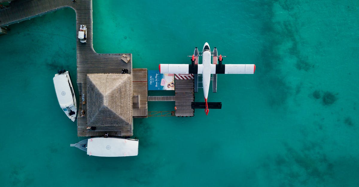 Is there such a thing as individual tourism with water plane? - Seaplane on water near bungalow Is there such a thing as individual tourism with water plane? - Seaplane on water near bungalow