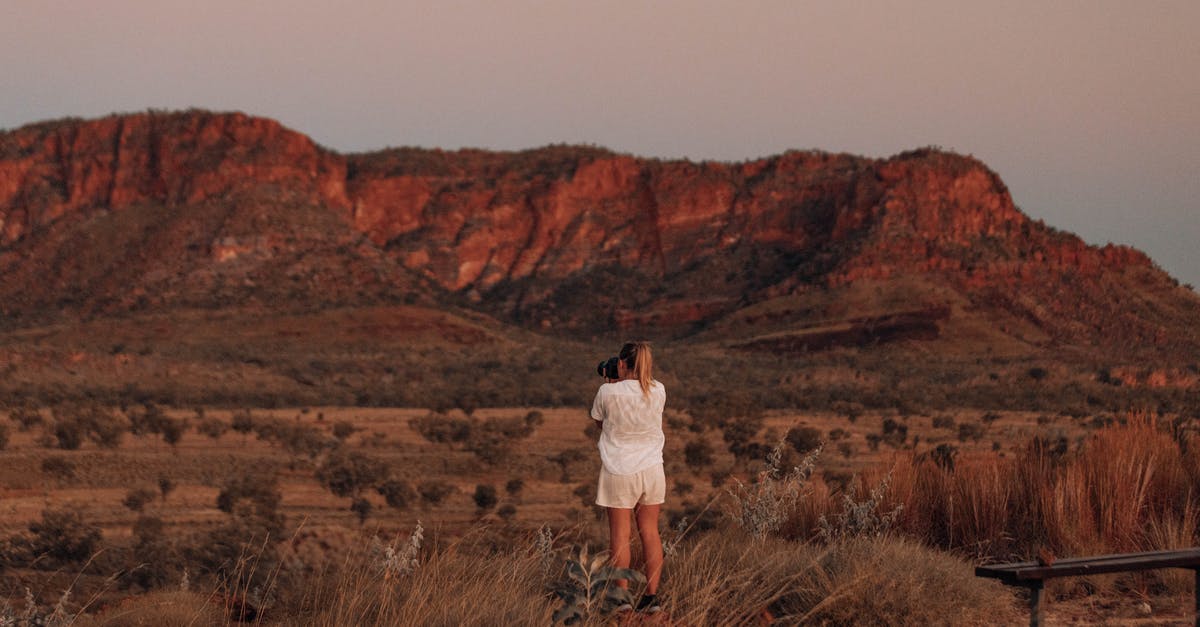 Is this back to back ticketing or throwaway ticketing? - Woman in White Long Sleeve Shirt Standing on Brown Grass Field Is this back to back ticketing or throwaway ticketing? - Woman in White Long Sleeve Shirt Standing on Brown Grass Field