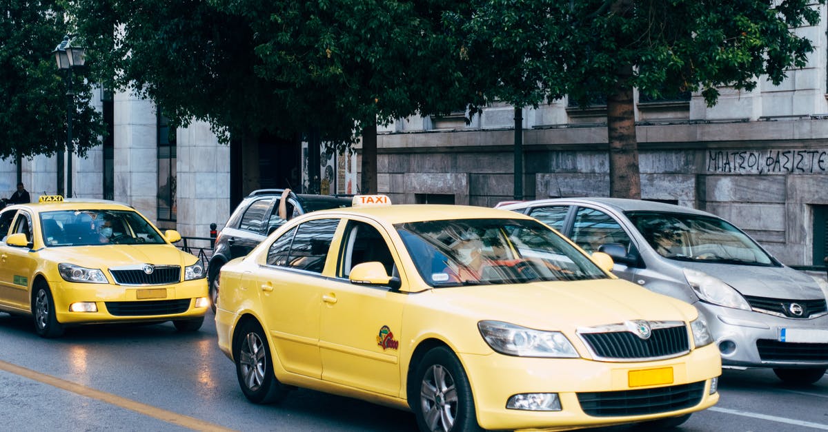 Is this taxi fare pricing correct? Ola cabs charging me for x2.8 instead of x1.8 [closed] - Yellow Taxi Cabs on the Road