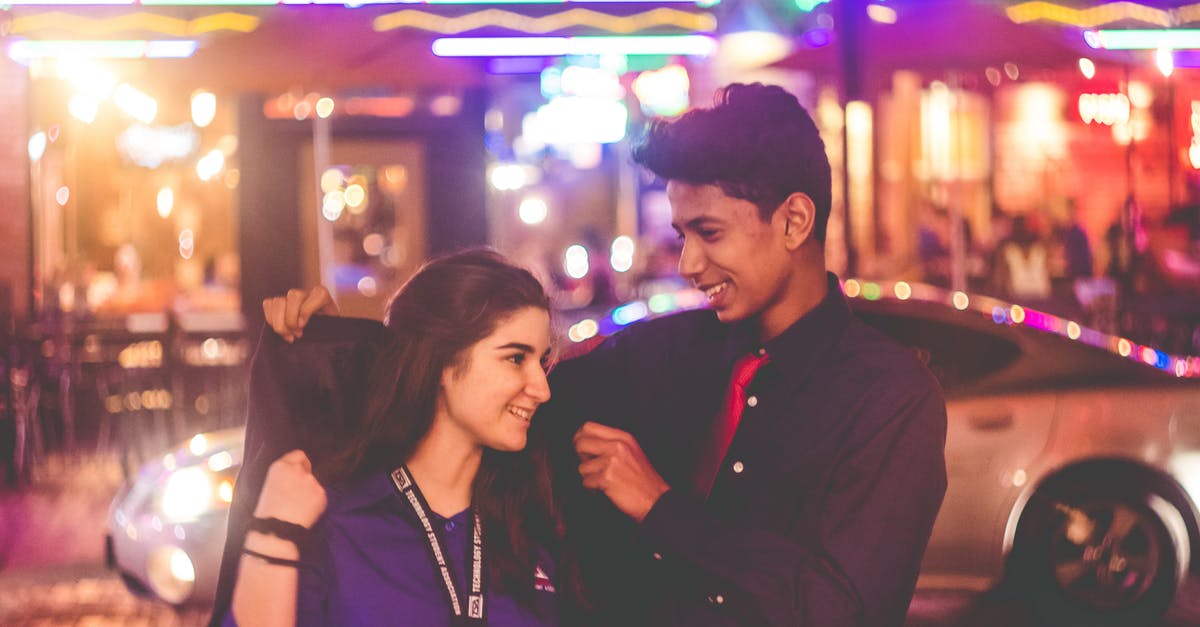 Is tipping mandatory at Restaurants and Bars in Germany? - Man Giving Jacket to Woman Is tipping mandatory at Restaurants and Bars in Germany? - Man Giving Jacket to Woman