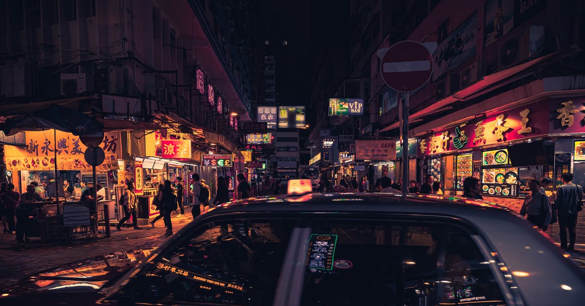Is tipping mandatory at restaurants in Canada? - Photo of Taxi Near Buildings During Nighttime Is tipping mandatory at restaurants in Canada? - Photo of Taxi Near Buildings During Nighttime