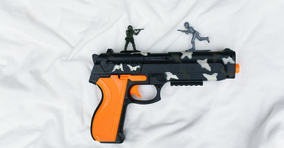 Is toy metal gun allowed on a Turkish Airways? - Plastic Pistol on White Sheet Is toy metal gun allowed on a Turkish Airways? - Plastic Pistol on White Sheet
