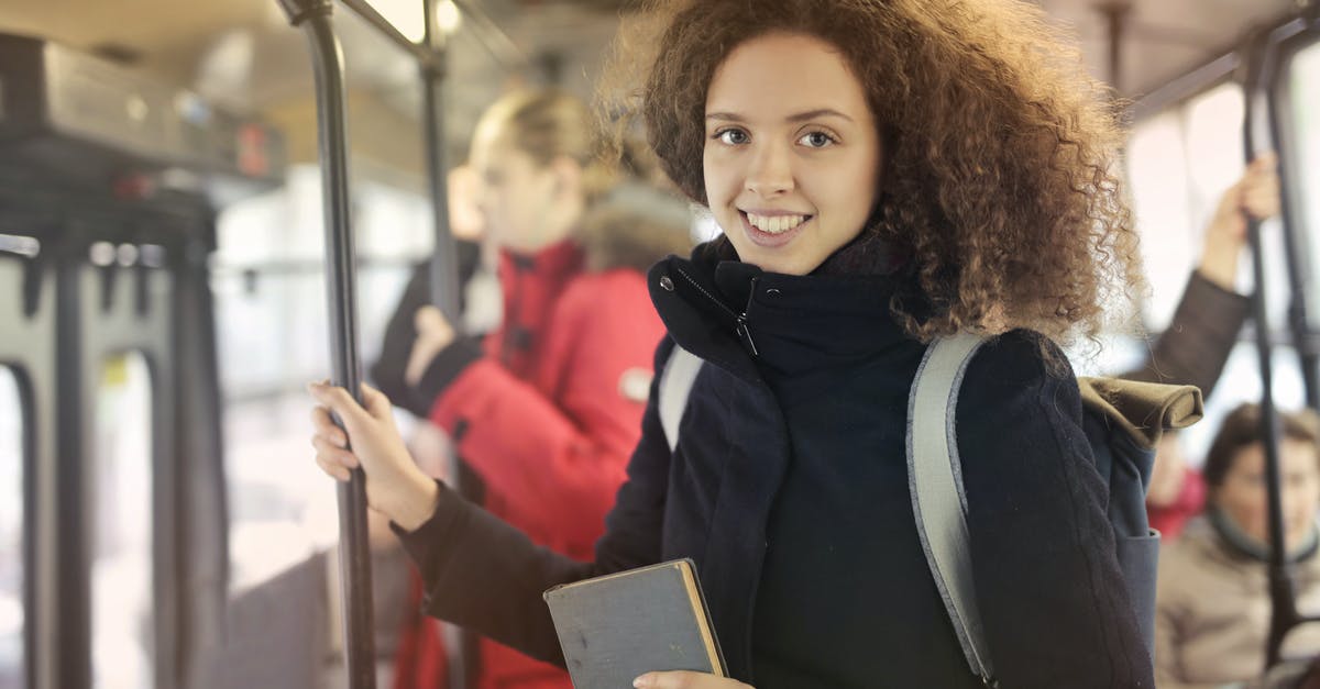 Is train or bus cheaper in Austria? - Woman in Black Coat Riding Subway Is train or bus cheaper in Austria? - Woman in Black Coat Riding Subway