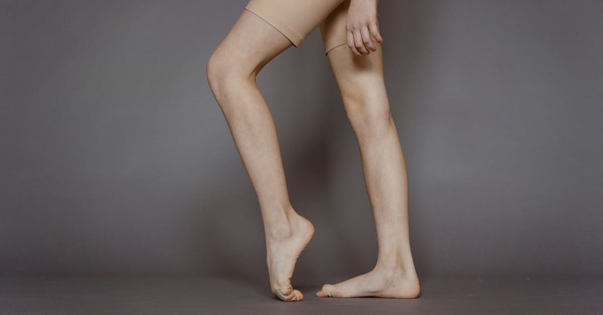 Is wearing shorts in Transsiberian trains okay - Crop woman bending foot in studio Is wearing shorts in Transsiberian trains okay - Crop woman bending foot in studio