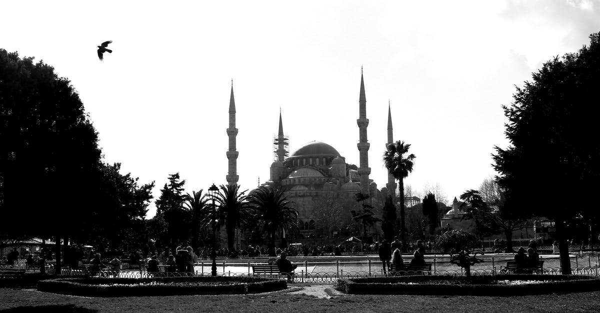 Istanbul to Mumbai on single ticket - People Walking Near Concrete Building Istanbul to Mumbai on single ticket - People Walking Near Concrete Building