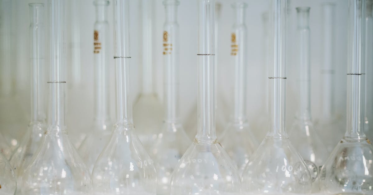 J-1 Visa Waiver after internship at Los Alamos National Laboratory [closed] - Clear Glass Bottles on White Table
