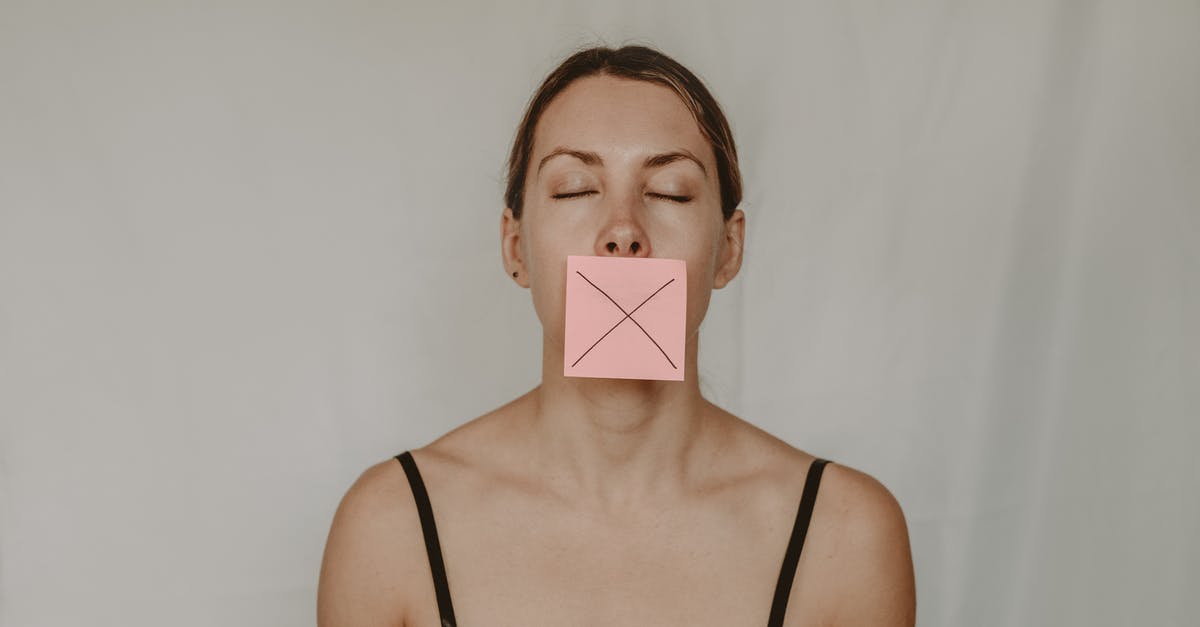 J1 visa with the “212 (e) rule does apply” - Young slender woman with closed eyes and mouth covered with sticky note showing cross on white background J1 visa with the “212 (e) rule does apply” - Young slender woman with closed eyes and mouth covered with sticky note showing cross on white background