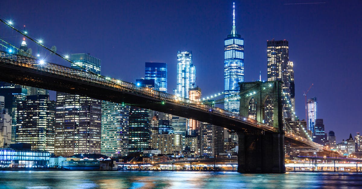 JFK airport to downtown Manhattan at night - Photography of Bridge during Nighttime JFK airport to downtown Manhattan at night - Photography of Bridge during Nighttime