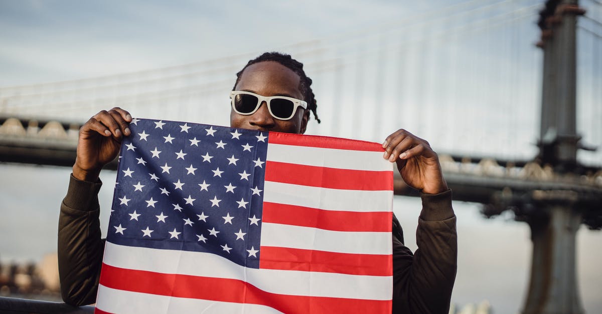 July 4th in NYC [closed] - Friendly man with US flag kerchief in hands