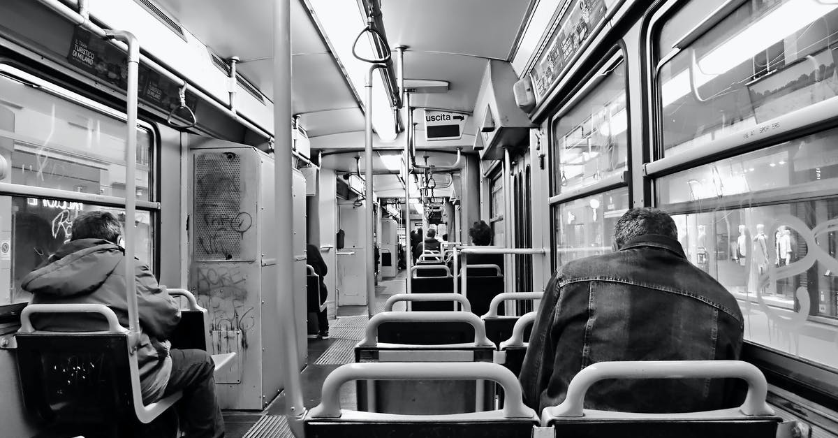 Kaza to Manali via Rohtang Pass in bus / shared vehicle - Grayscale Photo of People Sitting Inside Train Kaza to Manali via Rohtang Pass in bus / shared vehicle - Grayscale Photo of People Sitting Inside Train