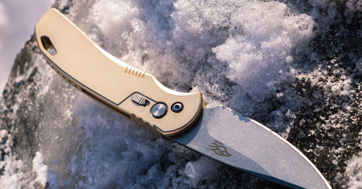 Keeping men's razor blades sharp for traveling - Silver and Gold Switchblade on Gray and White Surface Keeping men's razor blades sharp for traveling - Silver and Gold Switchblade on Gray and White Surface
