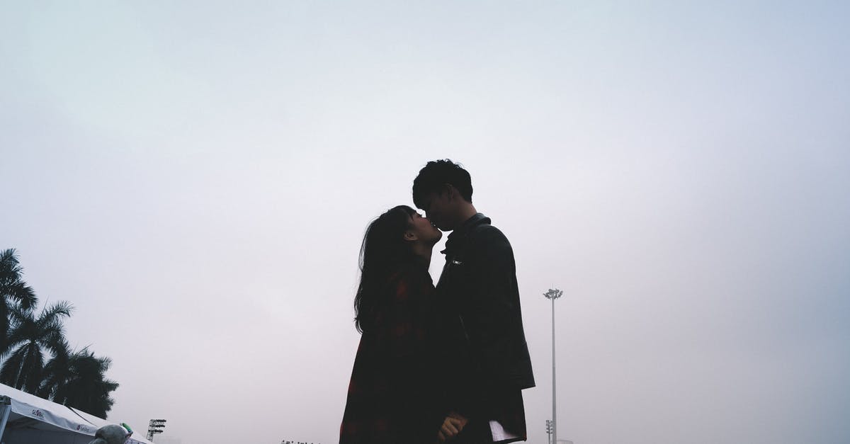 Korean transit visa required for Indians? - Couple Kissing Together Standing Near People Korean transit visa required for Indians? - Couple Kissing Together Standing Near People
