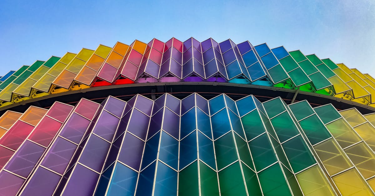 Kuala Lumpur (Malaysia) to Sumatra (Indonesia) by roro ferry - Blue and Yellow Glass Walled Building Kuala Lumpur (Malaysia) to Sumatra (Indonesia) by roro ferry - Blue and Yellow Glass Walled Building