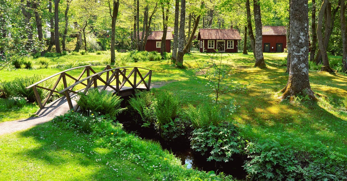 Kungsleden (Sweden King's Trail) cabins in mid-June? - Brown Wooden House Near the Creek With a Bridge