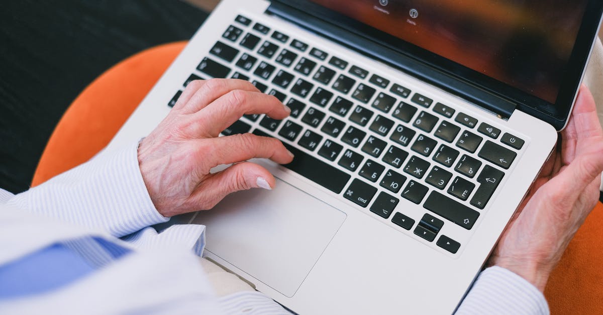 Laptop/mobile device in countries with Sharia - A Person's Hand Typing on a Laptop Keyboard Laptop/mobile device in countries with Sharia - A Person's Hand Typing on a Laptop Keyboard