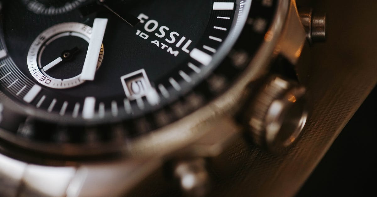 Larger metal objects in hand luggage - Close up of wristwatch on table Larger metal objects in hand luggage - Close up of wristwatch on table