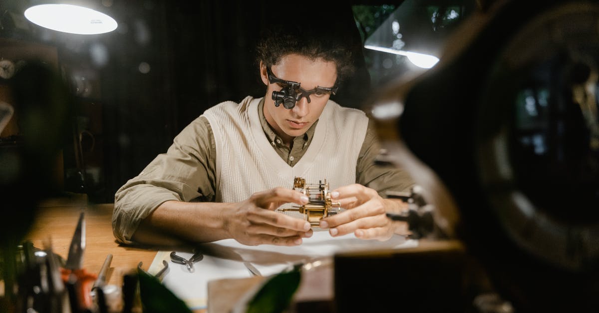Last minute hotel deals - Man in White Dress Shirt Wearing Black Sunglasses Sitting at Table Last minute hotel deals - Man in White Dress Shirt Wearing Black Sunglasses Sitting at Table