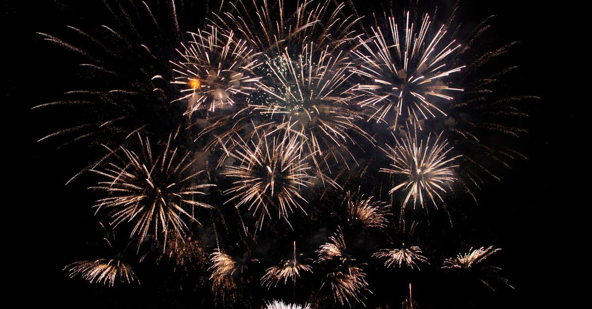 Late night buses from Helsinki airport to Turku in December? - Abstract of vibrant glowing fireworks exploding high in black sky late at night Late night buses from Helsinki airport to Turku in December? - Abstract of vibrant glowing fireworks exploding high in black sky late at night