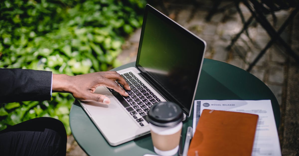 Late submission of API data - what's going to happen? - Crop anonymous black male freelancer working on netbook in park cafe Late submission of API data - what's going to happen? - Crop anonymous black male freelancer working on netbook in park cafe