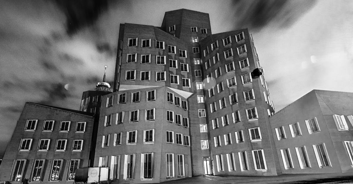 Layover at Dusseldorf and Frankfurt, category A or B visa? - Grayscale Photo of One of the Buildings of the New Zollhof in Dusseldorf, NRW, Deutschland