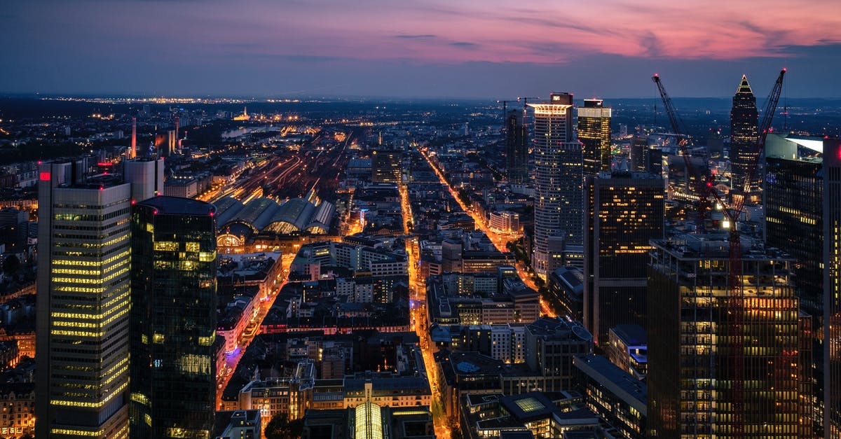 Layover In Frankfurt - Photo of City Skyline during Dusk Layover In Frankfurt - Photo of City Skyline during Dusk