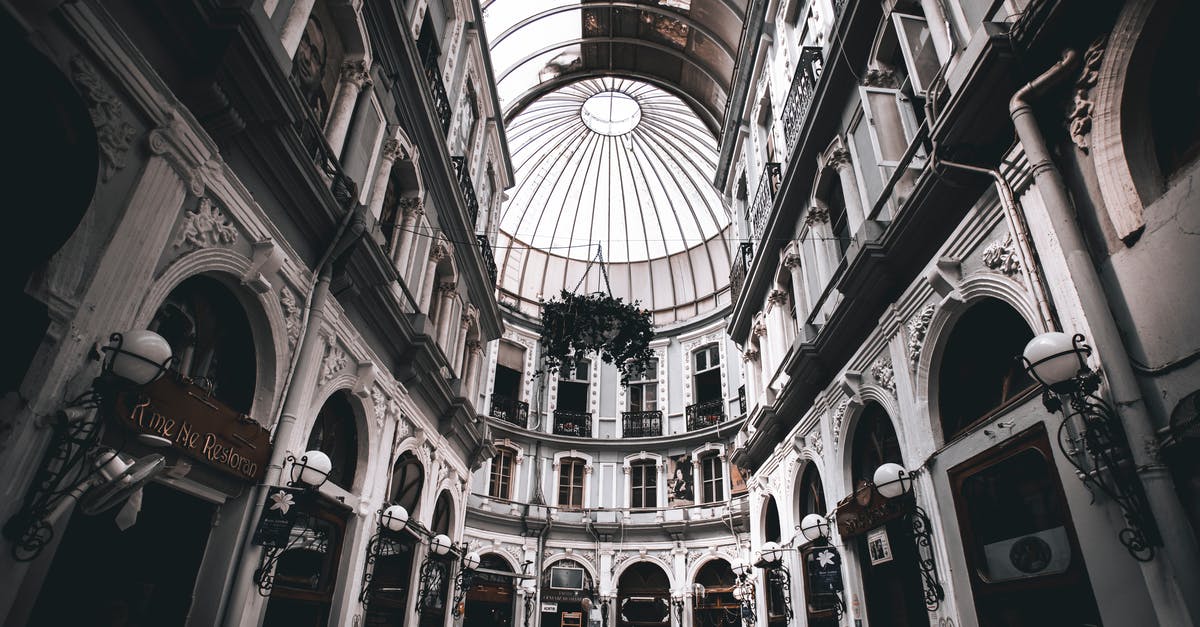 Layover in Istanbul - Interior of a Historic Building with Cafe Layover in Istanbul - Interior of a Historic Building with Cafe