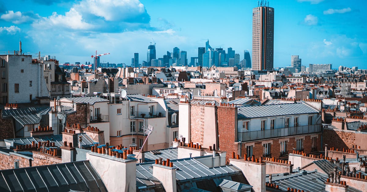 Least stressful method of travelling around Paris - Aerial View of City Buildings Under the Blue Sky Least stressful method of travelling around Paris - Aerial View of City Buildings Under the Blue Sky