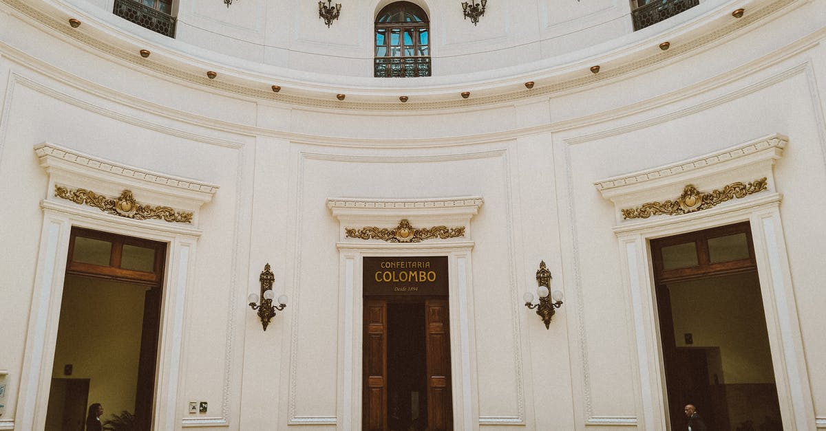 Leaving Brazil without entry form - Low angle fragment of interior of historical building with white stone walls and arched windows in colonial style in Rio de Janeiro in Brazil Leaving Brazil without entry form - Low angle fragment of interior of historical building with white stone walls and arched windows in colonial style in Rio de Janeiro in Brazil