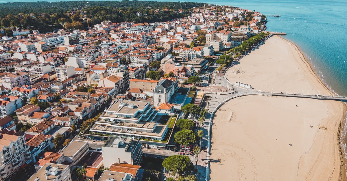 Leaving JFK with a French passport to enter Europe - Aerial View of Buildings near the Beach Leaving JFK with a French passport to enter Europe - Aerial View of Buildings near the Beach