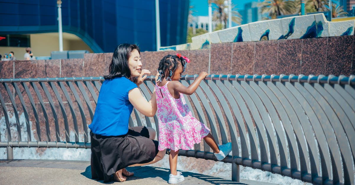 Leaving the States on Visa Waiver and coming back - Woman in Blue Dress Sitting on Bench Leaving the States on Visa Waiver and coming back - Woman in Blue Dress Sitting on Bench
