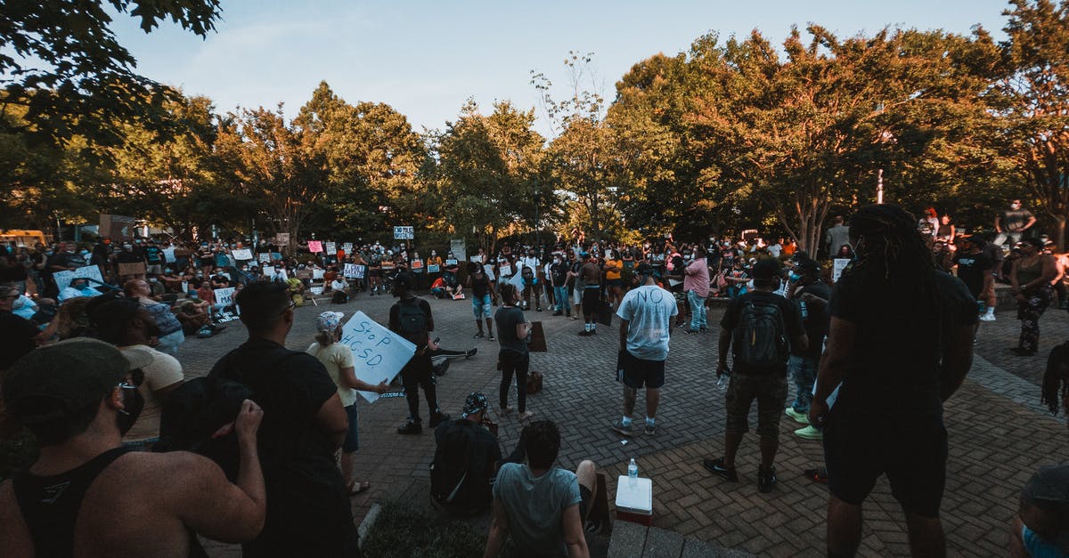 Left/right right of turn on an intersection in USA - Diverse people uniting on demonstration against politics Left/right right of turn on an intersection in USA - Diverse people uniting on demonstration against politics