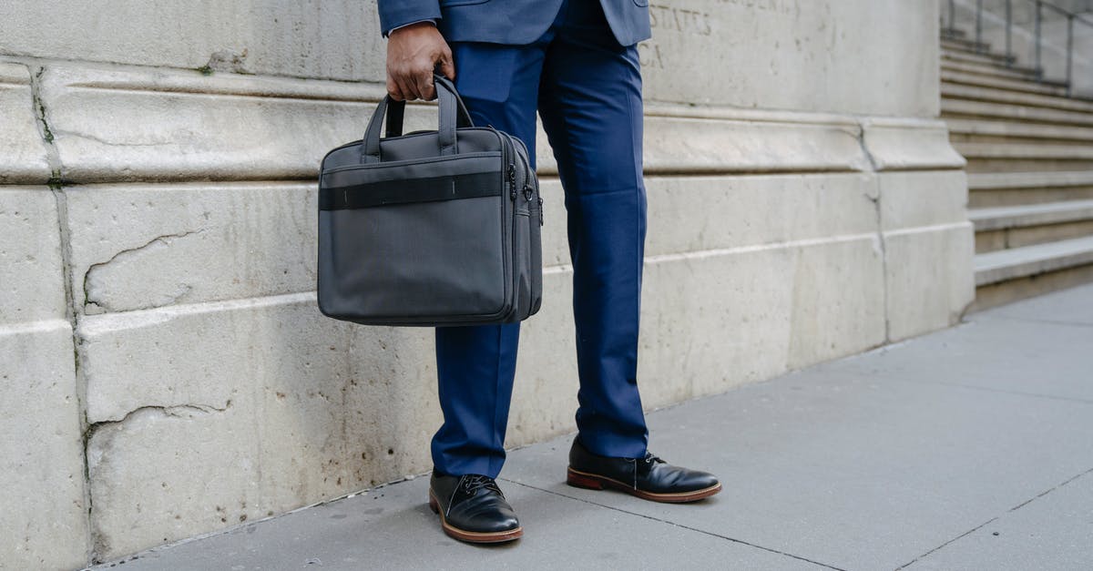 Legality of carrying spent ammunition - Man in Blue Suit Jacket and Blue Denim Jeans With Black Sling Bag Legality of carrying spent ammunition - Man in Blue Suit Jacket and Blue Denim Jeans With Black Sling Bag