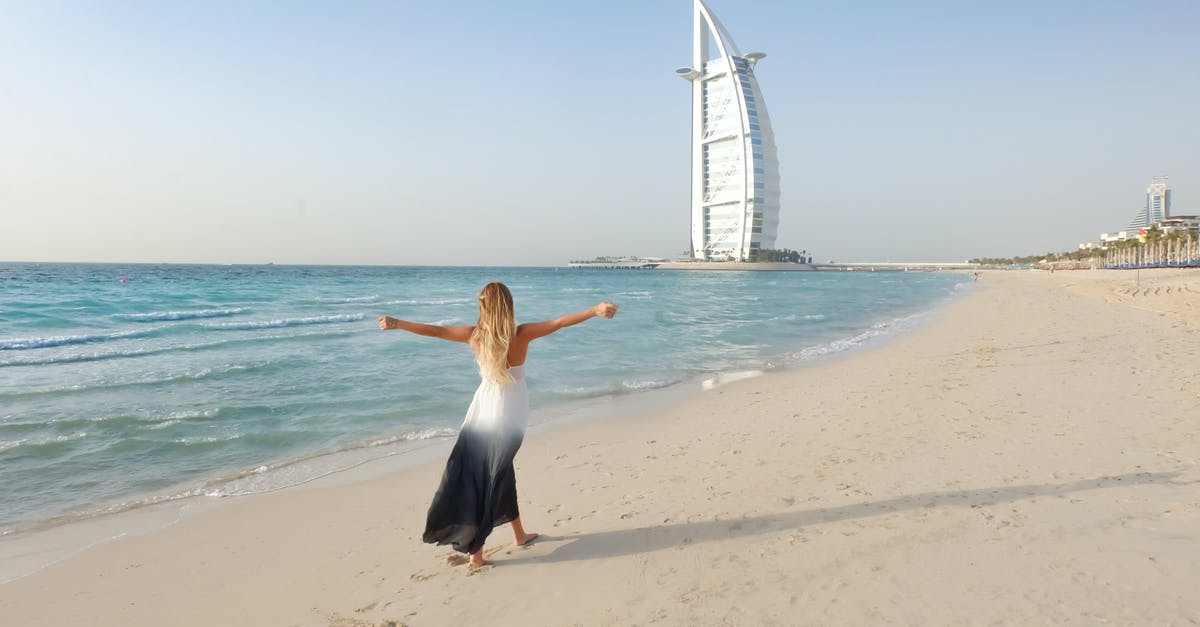 Leisure/single long-visit visa Dubai - Photography of Woman Walking On Seashore Leisure/single long-visit visa Dubai - Photography of Woman Walking On Seashore