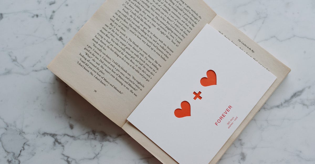Letter from Home Office after tourist visa refusal review - Opened book with valentine lying inside Letter from Home Office after tourist visa refusal review - Opened book with valentine lying inside