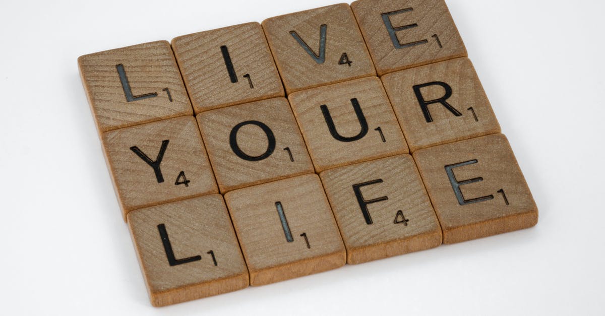 Letting someone else use your frequent flyer mile number? - Brown Wooden Blocks on White Surface Letting someone else use your frequent flyer mile number? - Brown Wooden Blocks on White Surface